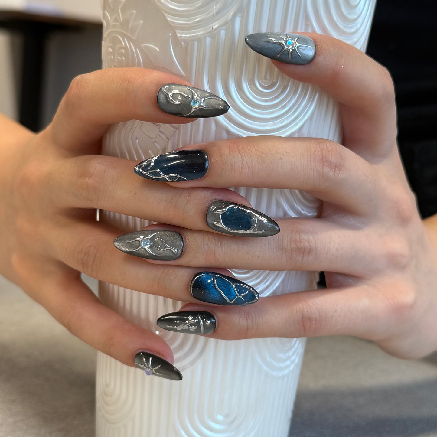 Midnight Steel Chrome Nails | Almond Cat Eye Press-On Nails with Silver Web & Blue Rhinestone Details