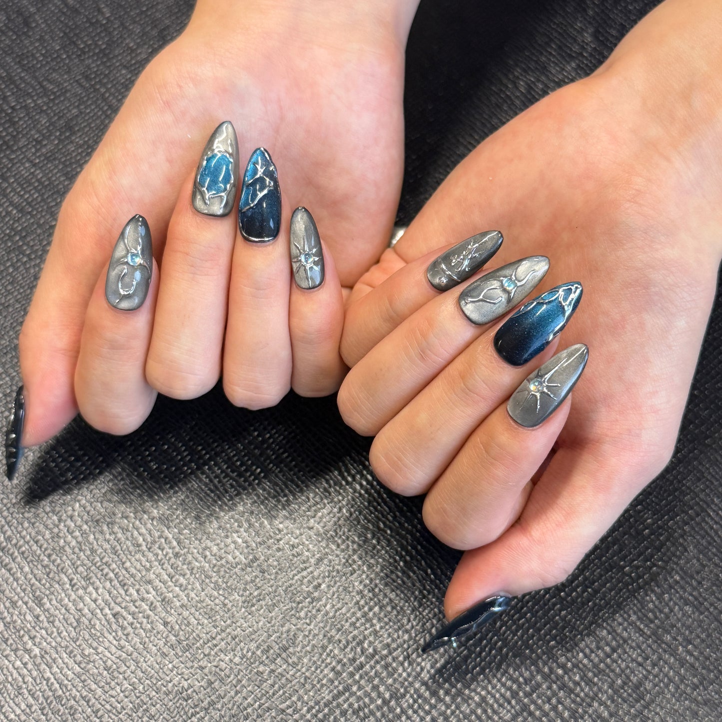 Midnight Steel Chrome Nails | Almond Cat Eye Press-On Nails with Silver Web & Blue Rhinestone Details